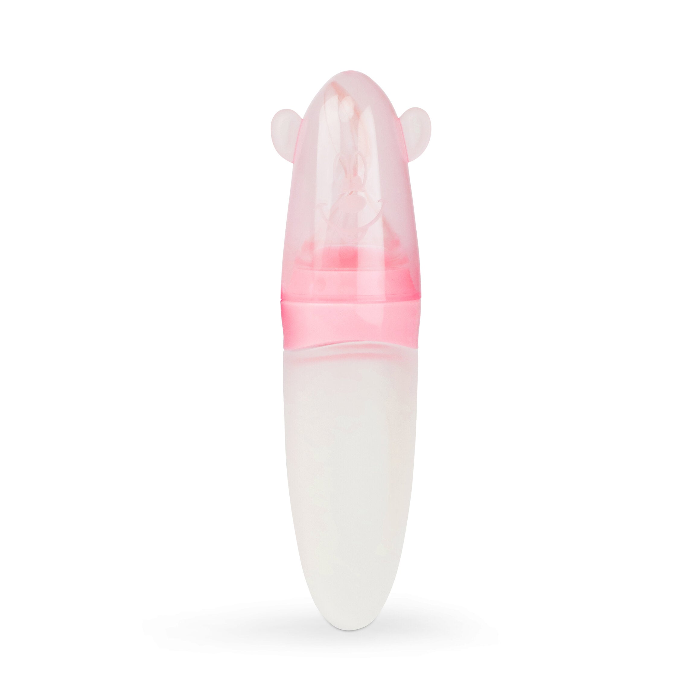 Een foto van de roze siliconen lepel met de beschermdop die rechtop staat. Op de dop is een smiley face uitgebeeld.
